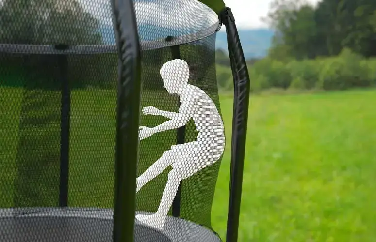 child safely falling into trampoline net