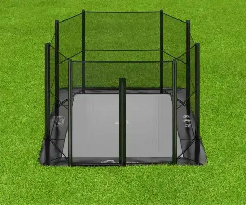 14 foot by 10 foot green inground trampoline with enclosure on grass