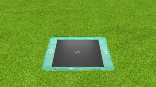 akrobat green rectangular inground trampoline on grass