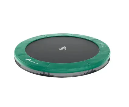 A vibrant green trampoline featuring a sleek black cover, positioned in a sunny backyard environment.