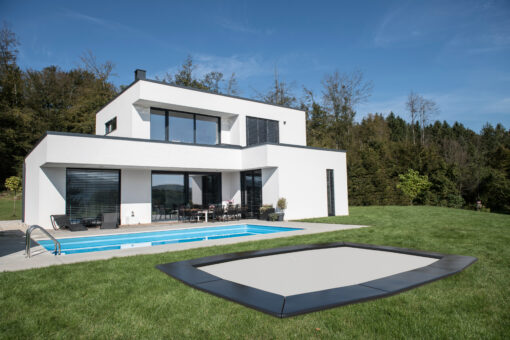 landscaped 17 foot by 10 foot black trampoline, Why Choose Akrobat,