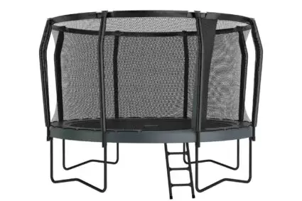 An outdoor trampoline featuring a protective net and a ladder for safe entry, surrounded by green grass.