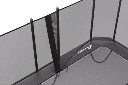 A trampoline with a safety net securely attached, ready for safe jumping and play.