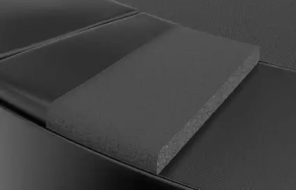 A stylish black seat cushion with a matching black cover, perfect for enhancing comfort in various seating options.