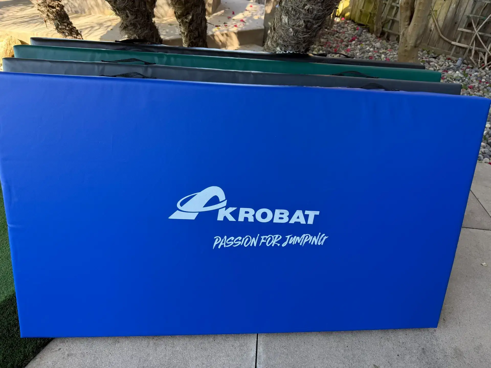 AkrobatUSA Landing Mat 6 A repetitive pattern of the word krobat displayed multiple times in a visually striking arrangement.