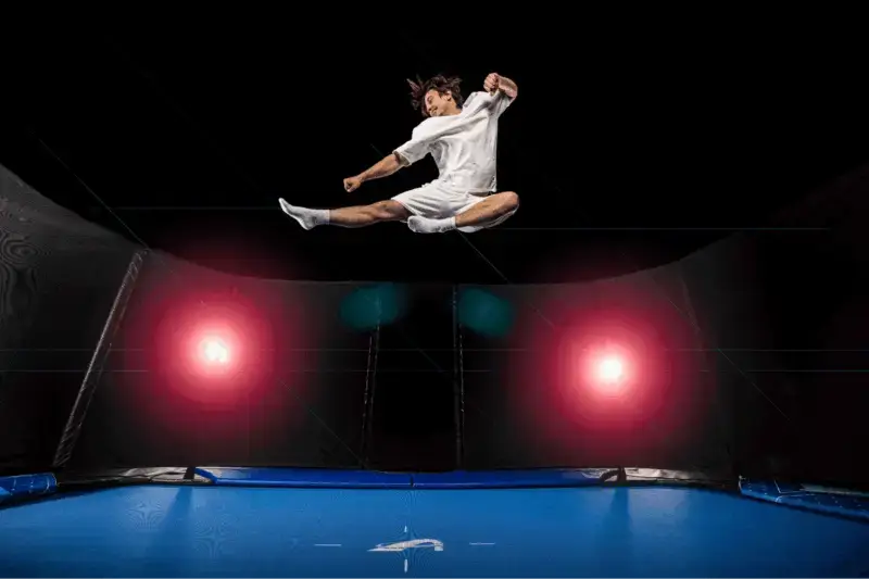 How Long Does a Trampoline Mat Last? Lifespan & Care Guide 2 athlete jumping on trampoline
